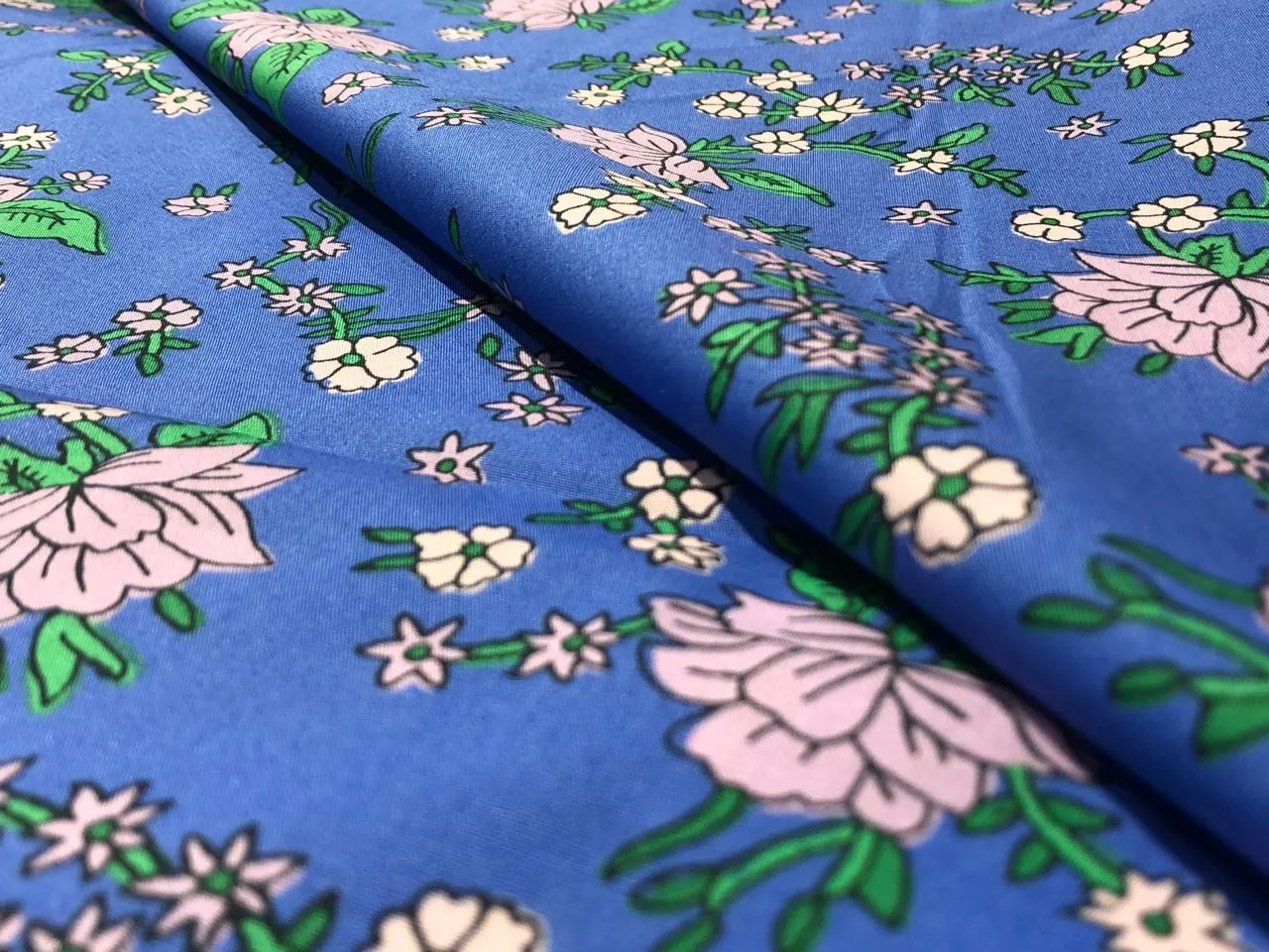 100% Cotton Poplin PRINT   58" wide RETRO BEACH available in 4 different prints pink ,orange, blue ,yellow ,green waves / black jungle with pink and blue parrots and flowers / blue with lavender pink flowers and black and white floral