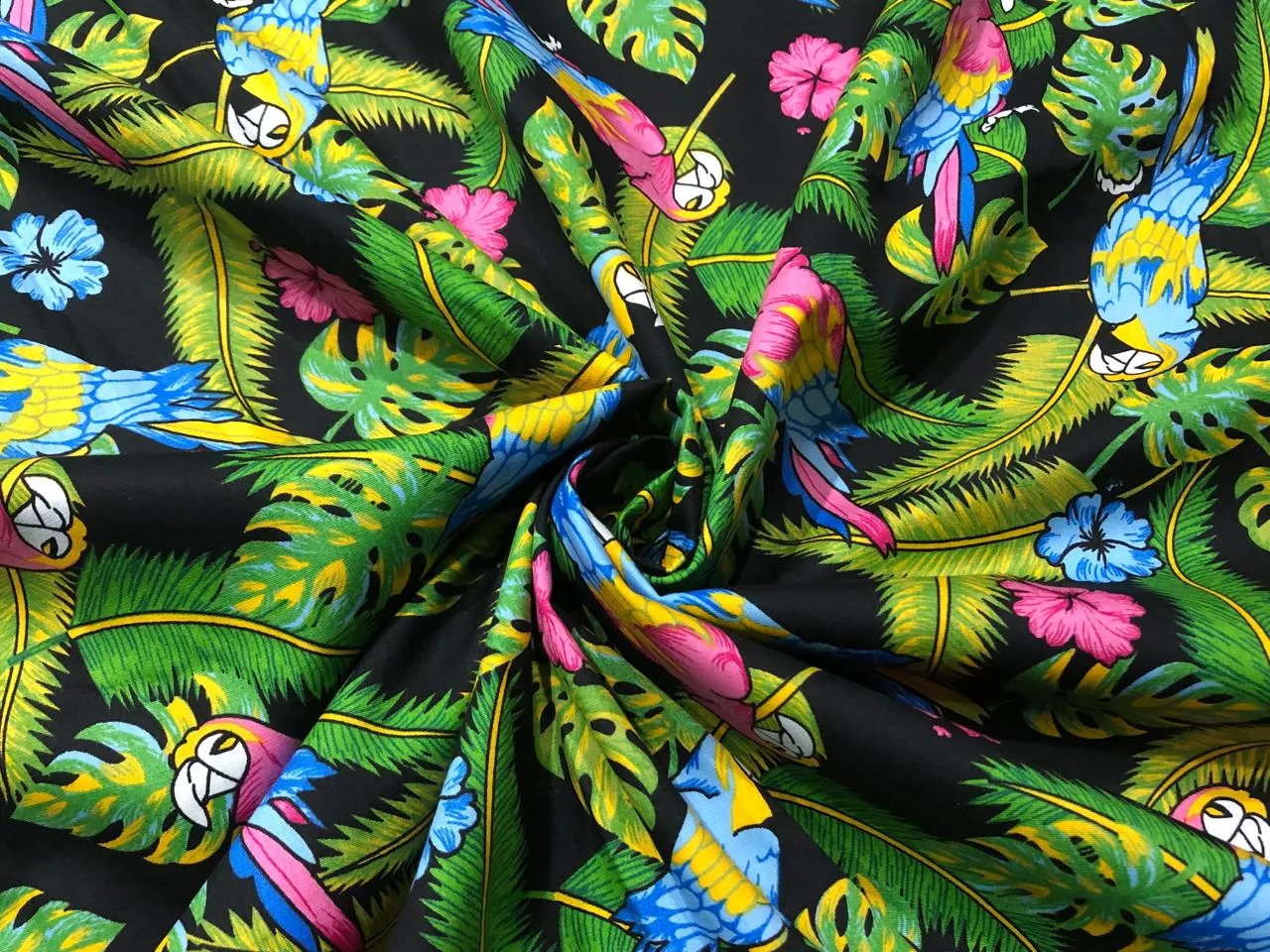 100% Cotton Poplin PRINT   58" wide RETRO BEACH available in 4 different prints pink ,orange, blue ,yellow ,green waves / black jungle with pink and blue parrots and flowers / blue with lavender pink flowers and black and white floral